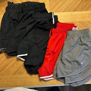 Six pairs of women’s Nike shorts all size medium